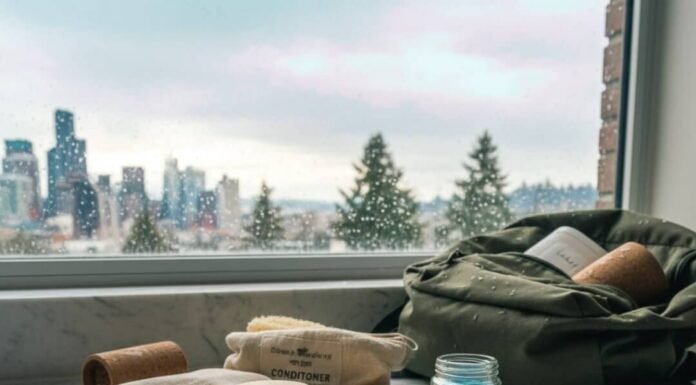 Best Eco Toiletries for a Plastic-Free Journey Messy eco toiletries on counter with Seattle view.